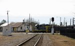 ATW 109 leads a short train across the CSX crossing